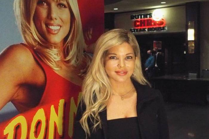 Donna derrico threw back to her baywatch days with a her red swimsuit themed 55th birthday post