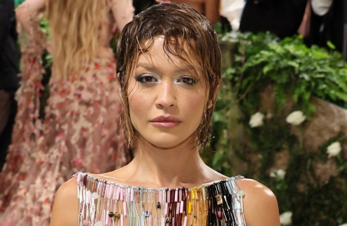 Rita ora rocks beaded vest to the beach and its the see through look for the summer