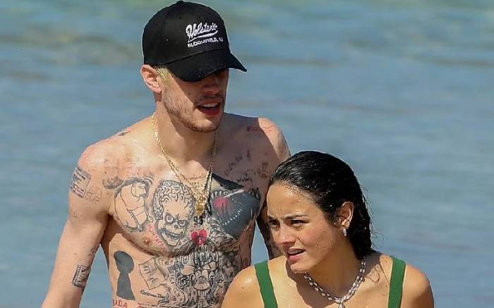 Pete davidson appears to have removed all of his kim kardashian tattoos even the branding as he vacations with chase sui wonders